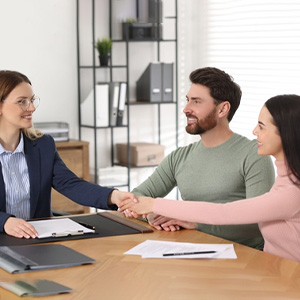 Oil and gas attorney meeting clients for initial consultation in Texas.